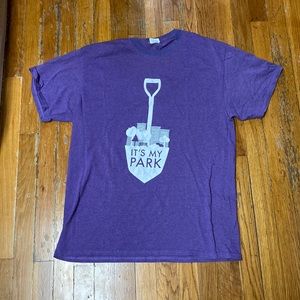 Oversized purple tee with a shovel